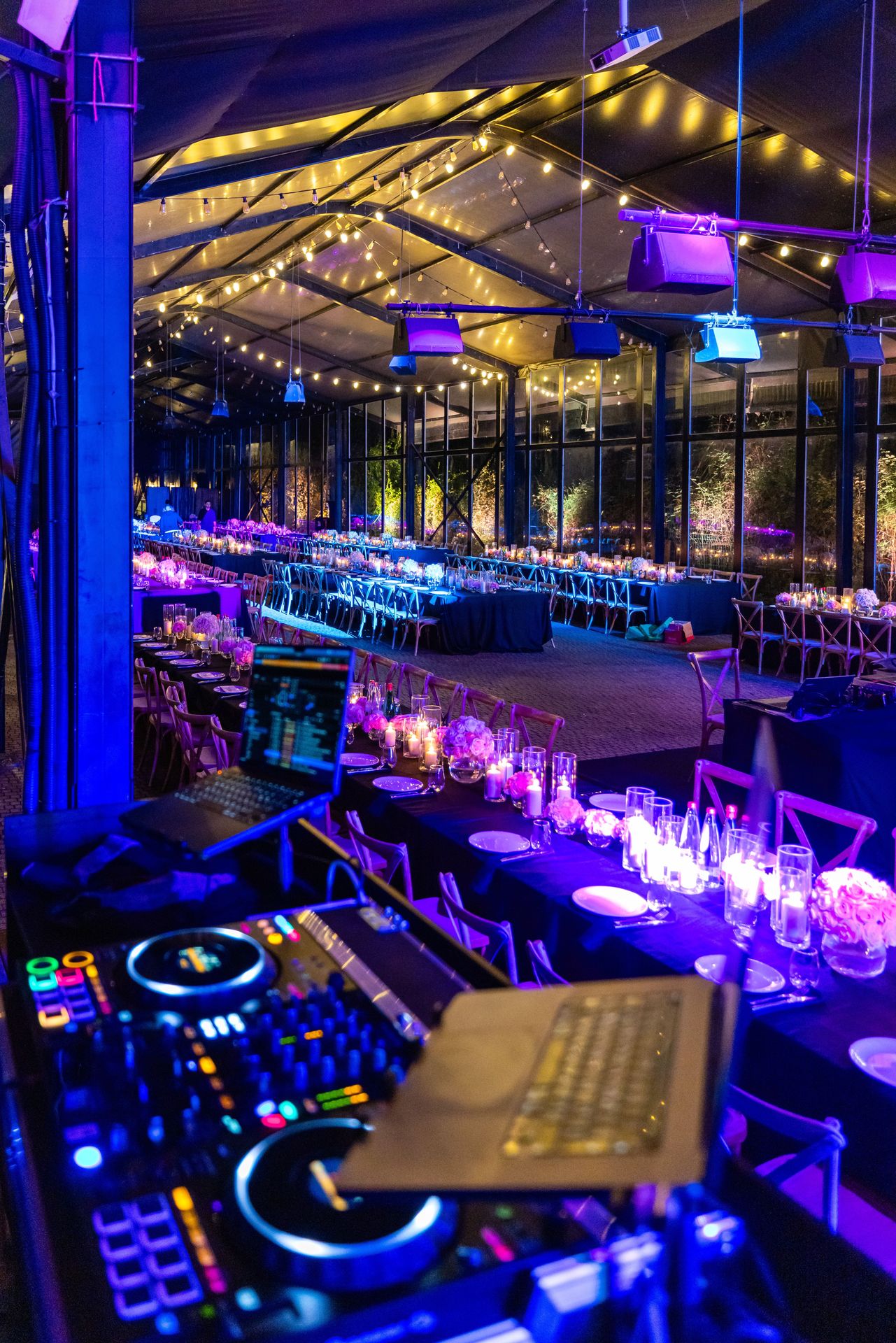 Reception venue washed in coloured architectural up-lighting